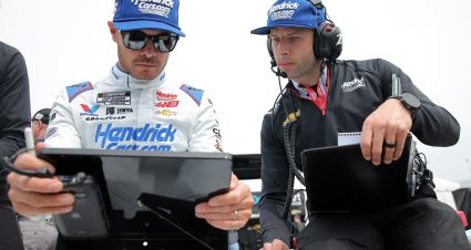 RICHMOND, VIRGINIA - MARCH 30: Kyle Larson, driver of the #5 HendrickCars.com Chevrolet, and crew chief Cliff Daniels work on the grid during qualifying for the NASCAR Cup Series Toyota Owners 400 at Richmond Raceway on March 30, 2024 in Richmond, Virginia. (Photo by Jonathan Bachman/Getty Images) | Getty Images