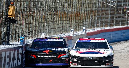 FORT WORTH, TEXAS - APRIL 13: Sam Mayer, driver of the #1 Carolina Carports Chevrolet, crosses the finish line ahead of Ryan Sieg, driver of the #39 Sci Aps Ford, to win the NASCAR Xfinity Series Andy's Frozen Custard 300 at Texas Motor Speedway on April 13, 2024 in Fort Worth, Texas. (Photo by Jared C. Tilton/Getty Images) | Getty Images