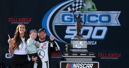 TALLADEGA, ALABAMA - APRIL 21: Tyler Reddick, driver of the #45 Jordan Brand Toyota, celebrates with wife, Alexa De Leon and son, Beau Reddick in victory lane after winning the NASCAR Cup Series GEICO 500 at Talladega Superspeedway on April 21, 2024 in Talladega, Alabama. (Photo by James Gilbert/Getty Images) | Getty Images