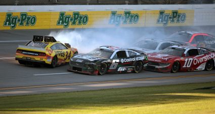 TALLADEGA, ALABAMA - APRIL 21: Michael McDowell, driver of the #34 Love's Travel Stops Ford, spins after an on-track incident on the final lap of the NASCAR Cup Series GEICO 500 at Talladega Superspeedway on April 21, 2024 in Talladega, Alabama. (Photo by James Gilbert/Getty Images) | Getty Images