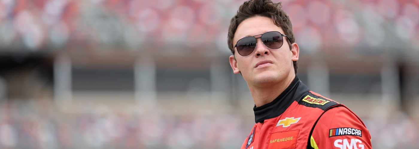 TALLADEGA, ALABAMA - APRIL 21: Gray Gaulding, driver of the #08 Panini NFT Chevrolet, looks on during qualifying for the NASCAR Xfinity Series Ag-Pro 300 at Talladega Superspeedway on April 21, 2023 in Talladega, Alabama. (Photo by James Gilbert/Getty Images) | Getty Images