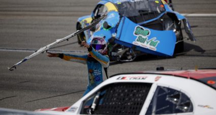 RICHMOND, VIRGINIA - MARCH 30: Joey Gase, driver of the #35 NCPC Race Against Crime Chevrolet, throws his wrecked rear bumper cover at Dawson Cram, driver of the #4 TeamJDMotorsports.com Chevrolet,  after an on-track incident during the NASCAR Xfinity Series ToyotaCare 250 at Richmond Raceway on March 30, 2024 in Richmond, Virginia. (Photo by Alex Slitz/Getty Images) | Getty Images