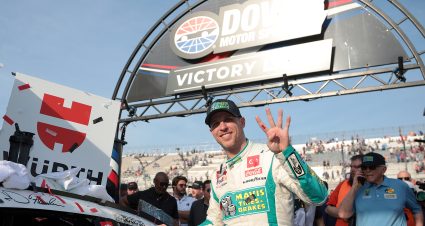 DOVER, DELAWARE - APRIL 28: Denny Hamlin, driver of the #11 Mavis Tire Toyota, poses with the winner sticker on his car in victory lane after winning the NASCAR Cup Series Würth 400 at Dover International Speedway on April 28, 2024 in Dover, Delaware. (Photo by James Gilbert/Getty Images) | Getty Images