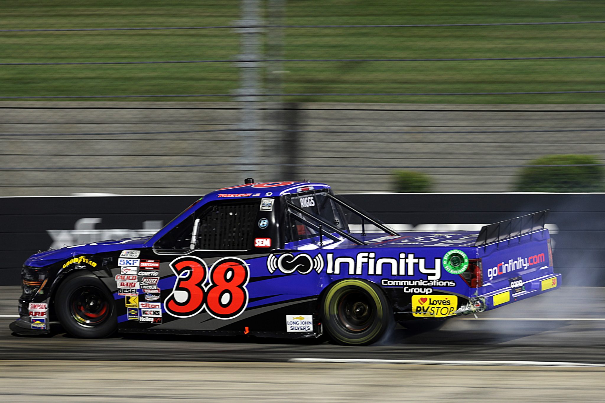 MARTINSVILLE, VIRGINIA - APRIL 05: Layne Riggs, driver of the #38 Infinity Communications Group Ford, spins after an on-track incident during the NASCAR Craftsman Long John Silver's 200 at Martinsville Speedway on April 05, 2024 in Martinsville, Virginia. (Photo by James Gilbert/Getty Images) | Getty Images