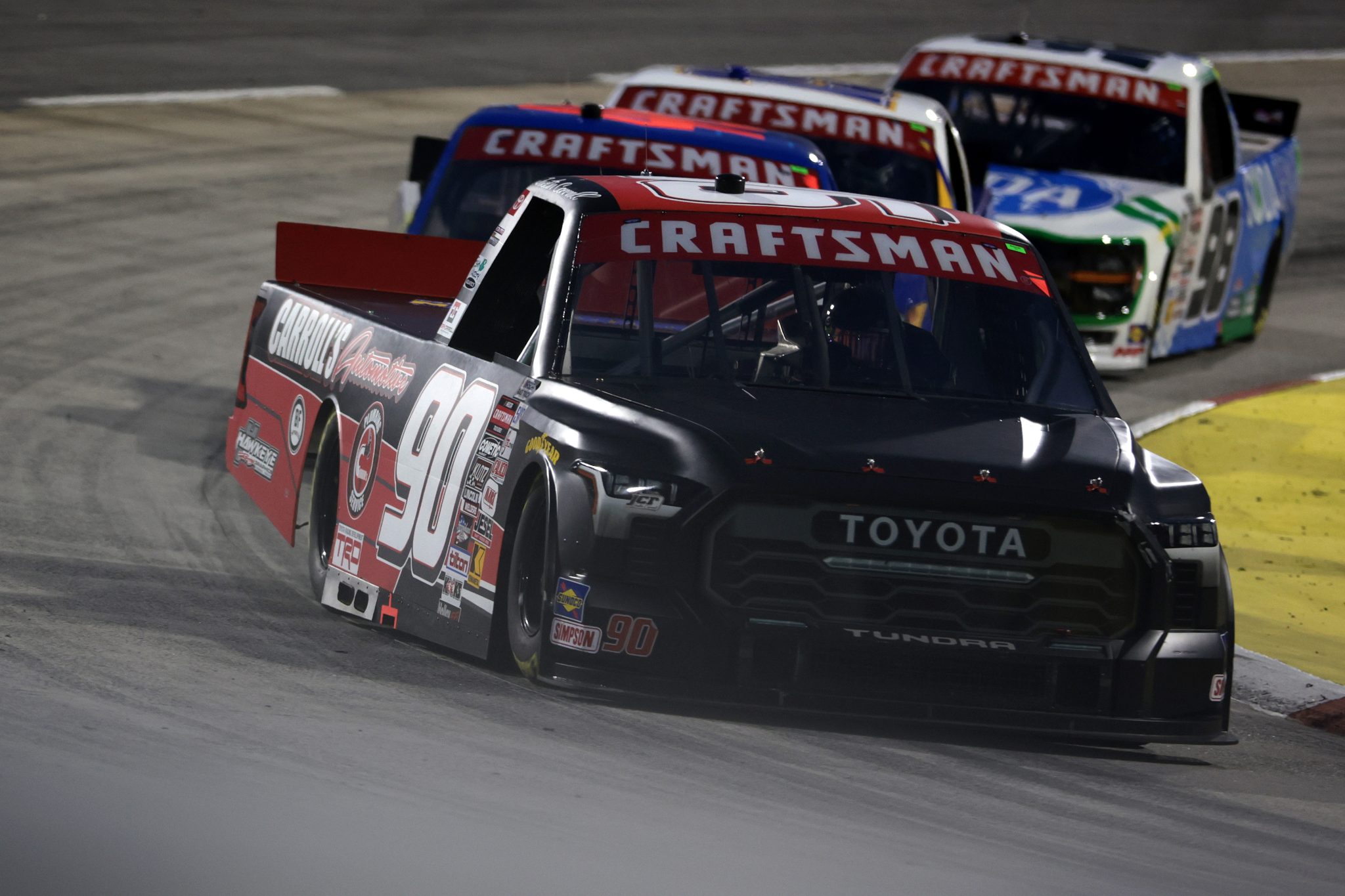 MARTINSVILLE, VIRGINIA - APRIL 05: Justin Carroll, driver of the #90 Carroll's Automotive/Duratain Toyota, drives during the NASCAR Craftsman Long John Silver's 200 at Martinsville Speedway on April 05, 2024 in Martinsville, Virginia. (Photo by James Gilbert/Getty Images) | Getty Images