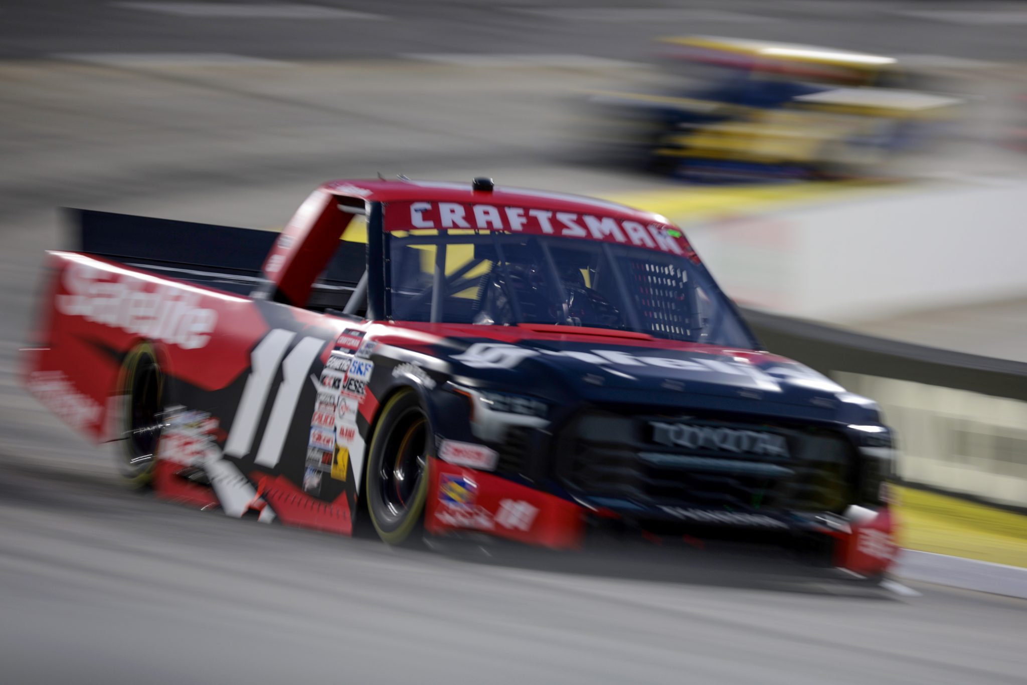 MARTINSVILLE, VIRGINIA - APRIL 05: Corey Heim, driver of the #11 Safelite Toyota, drives during the NASCAR Craftsman Long John Silver's 200 at Martinsville Speedway on April 05, 2024 in Martinsville, Virginia. (Photo by James Gilbert/Getty Images) | Getty Images