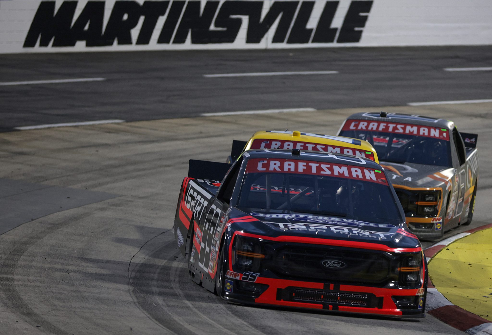 MARTINSVILLE, VIRGINIA - APRIL 05: Ben Rhodes, driver of the #99 TSPORT Trucks Ford, drives during the NASCAR Craftsman Long John Silver's 200 at Martinsville Speedway on April 05, 2024 in Martinsville, Virginia. (Photo by James Gilbert/Getty Images) | Getty Images