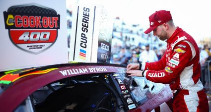 MARTINSVILLE, VIRGINIA - APRIL 07: William Byron, driver of the #24 Axalta Ruby Chevrolet, places the winner sticker on his car in victory lane after winning the NASCAR Cup Series Cook Out 400 at Martinsville Speedway on April 07, 2024 in Martinsville, Virginia. (Photo by Jared C. Tilton/Getty Images) | Getty Images