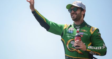DARLINGTON, SOUTH CAROLINA - MAY 12: Daniel Suarez, driver of the #99 Quaker State Chevrolet, waves to fans as he walks onstage during driver intros prior to  the NASCAR Cup Series Goodyear 400 at Darlington Raceway on May 12, 2024 in Darlington, South Carolina. (Photo by James Gilbert/Getty Images) | Getty Images