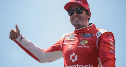 DARLINGTON, SOUTH CAROLINA - MAY 12: Noah Gragson, driver of the #10 Overstock.com Ford, waves to fans as he walks onstage during driver intros prior to  the NASCAR Cup Series Goodyear 400 at Darlington Raceway on May 12, 2024 in Darlington, South Carolina. (Photo by James Gilbert/Getty Images) | Getty Images