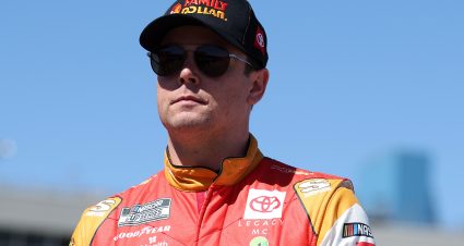 AVONDALE, ARIZONA - MARCH 09: Erik Jones, driver of the #43 Family Dollar Toyota, walks the grid during qualifying for the NASCAR Cup Series Shriners Children's 500 at Phoenix Raceway on March 09, 2024 in Avondale, Arizona. (Photo by Meg Oliphant/Getty Images) | Getty Images