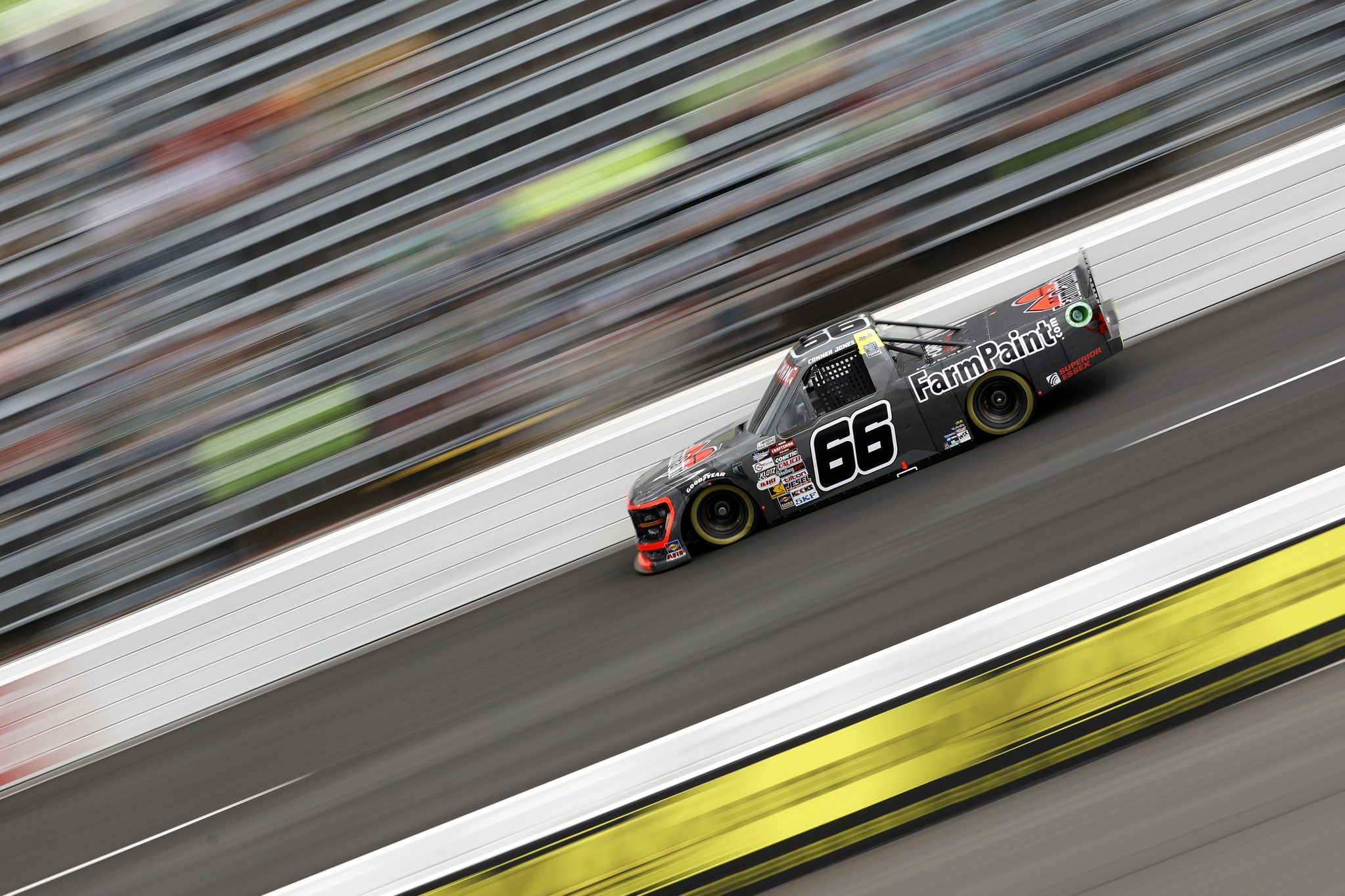 NORTH WILKESBORO, NORTH CAROLINA - MAY 17: Conner Jones, driver of the #66 Farm Paint Ford, drives during practice for the NASCAR Craftsman Truck Series Wright Brand 250 at North Wilkesboro Speedway on May 17, 2024 in North Wilkesboro, North Carolina. (Photo by Sean Gardner/Getty Images) | Getty Images