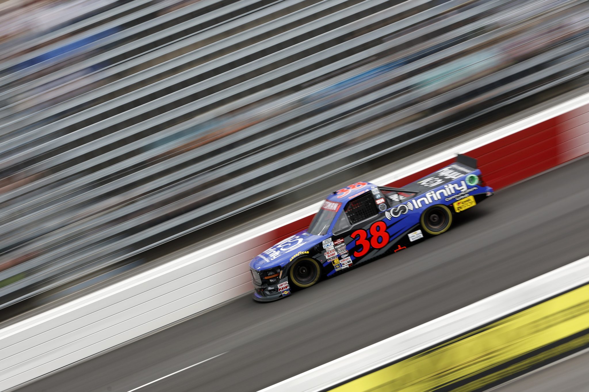 NORTH WILKESBORO, NORTH CAROLINA - MAY 17: Layne Riggs, driver of the #38 Infinity Communications Group Ford, drives during practice for the NASCAR Craftsman Truck Series Wright Brand 250 at North Wilkesboro Speedway on May 17, 2024 in North Wilkesboro, North Carolina. (Photo by Sean Gardner/Getty Images) | Getty Images