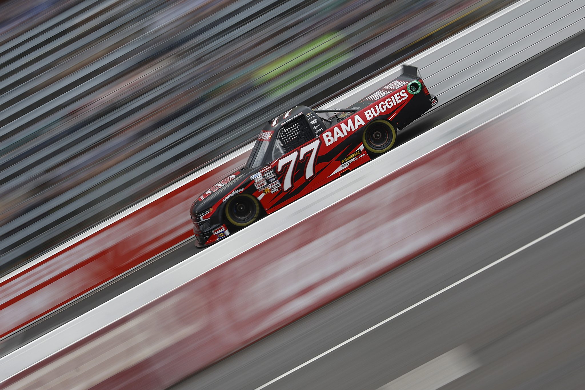 NORTH WILKESBORO, NORTH CAROLINA - MAY 17: Chase Purdy, driver of the #77 Bama Buggies Chevrolet, drives during practice for the NASCAR Craftsman Truck Series Wright Brand 250 at North Wilkesboro Speedway on May 17, 2024 in North Wilkesboro, North Carolina. (Photo by Sean Gardner/Getty Images) | Getty Images