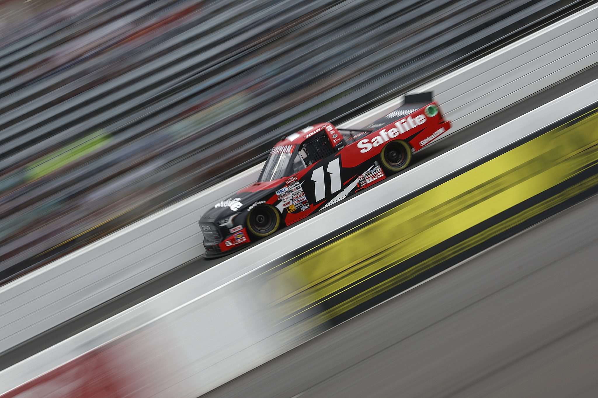 NORTH WILKESBORO, NORTH CAROLINA - MAY 17: Corey Heim, driver of the #11 Safelite Toyota, drives during practice for the NASCAR Craftsman Truck Series Wright Brand 250 at North Wilkesboro Speedway on May 17, 2024 in North Wilkesboro, North Carolina. (Photo by Sean Gardner/Getty Images) | Getty Images