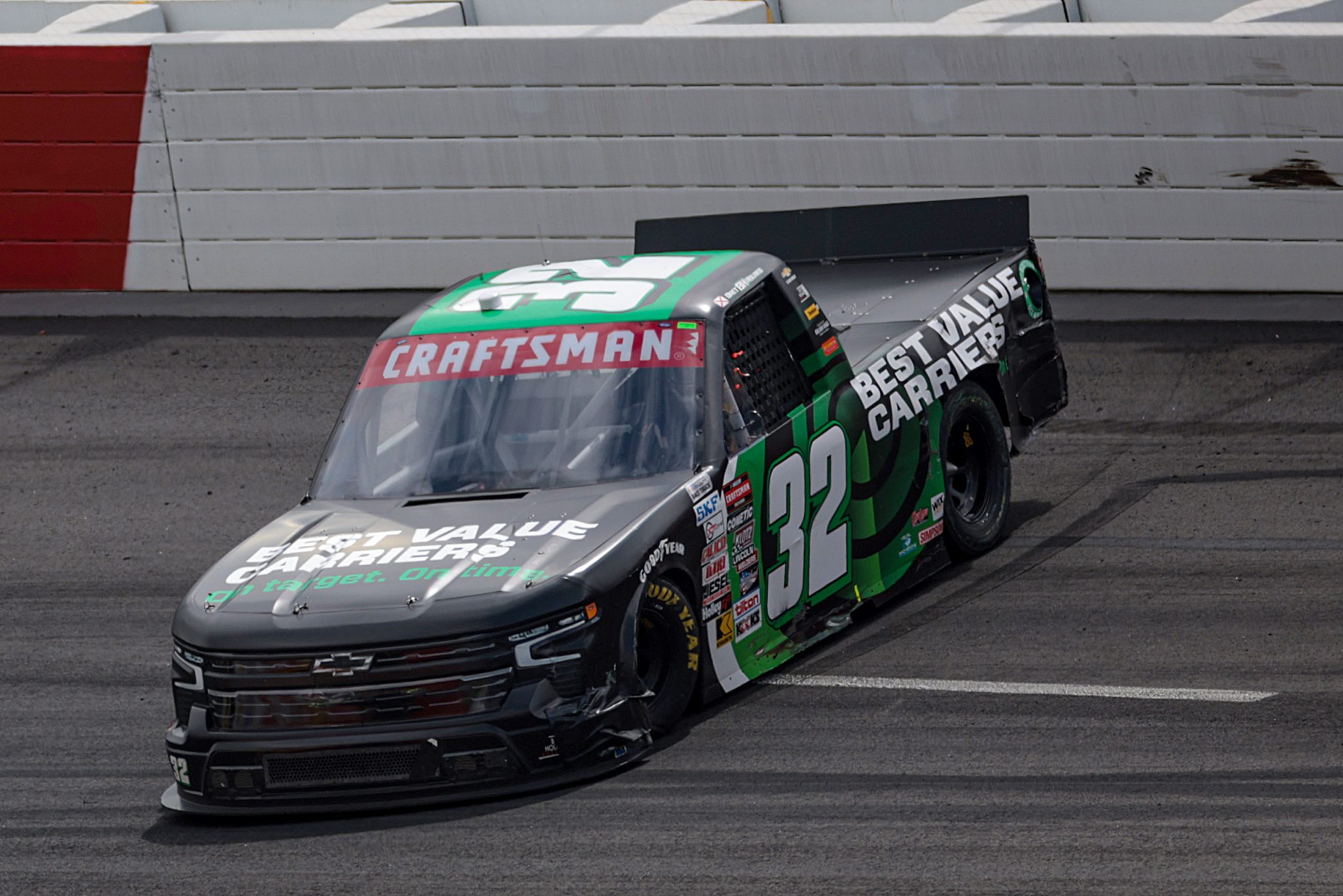 NORTH WILKESBORO, NORTH CAROLINA - MAY 19: Bret Holmes, driver of the #32 Best Value Carriers Chevrolet, spins after an on-track incident during the NASCAR Craftsman Truck Series Wright Brand 250 at North Wilkesboro Speedway on May 19, 2024 in North Wilkesboro, North Carolina. (Photo by James Gilbert/Getty Images) | Getty Images