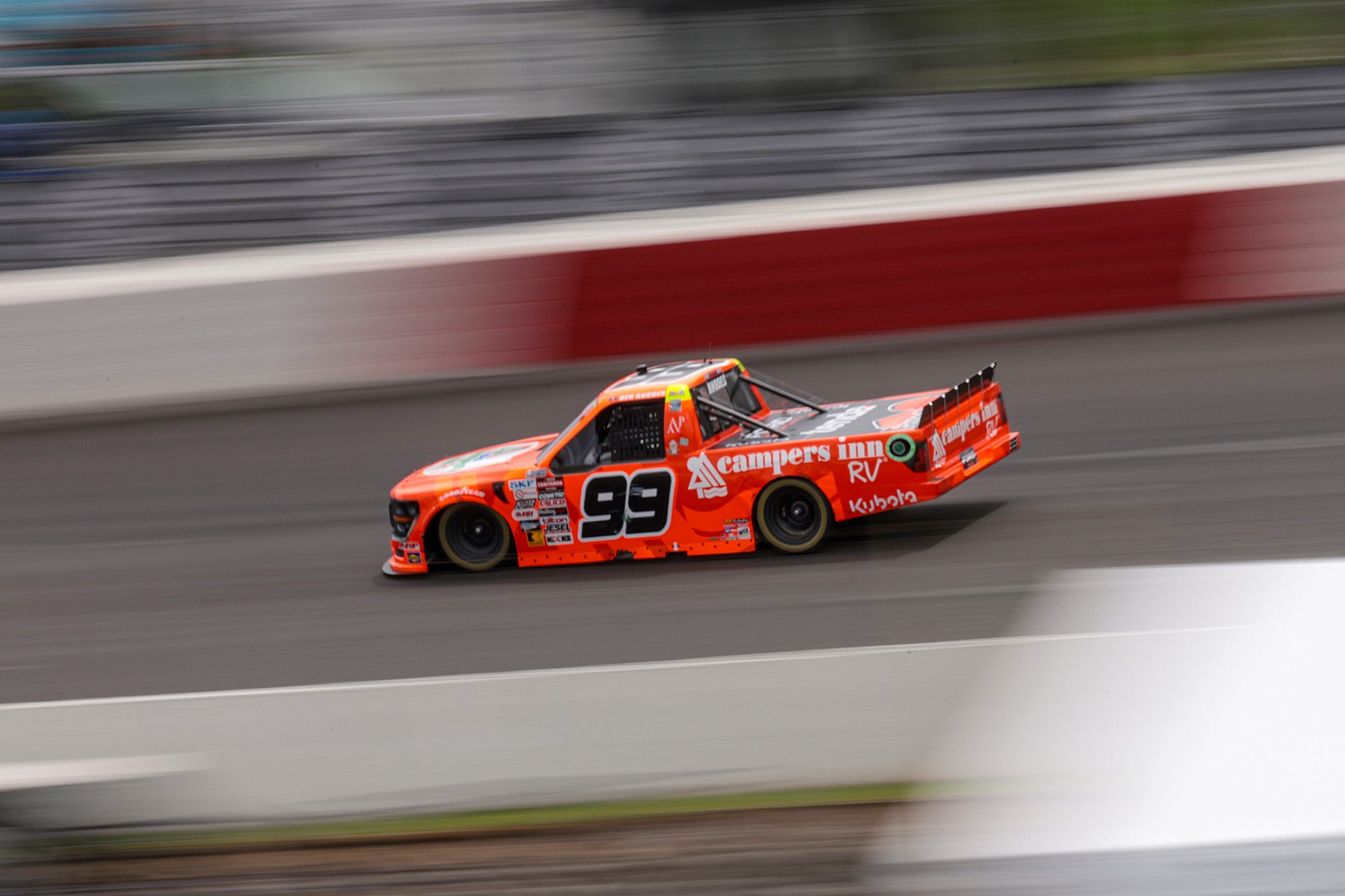 NORTH WILKESBORO, NORTH CAROLINA - MAY 19: Ben Rhodes, driver of the #99 Campers Inn RV Ford, drives during the NASCAR Craftsman Truck Series Wright Brand 250 at North Wilkesboro Speedway on May 19, 2024 in North Wilkesboro, North Carolina. (Photo by James Gilbert/Getty Images) | Getty Images
