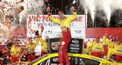 NORTH WILKESBORO, NORTH CAROLINA - MAY 19: Joey Logano, driver of the #22 Shell Pennzoil Ford, celebrates in victory lane after winning the NASCAR Cup Series All-Star Race at North Wilkesboro Speedway on May 19, 2024 in North Wilkesboro, North Carolina. (Photo by Sean Gardner/Getty Images) | Getty Images
