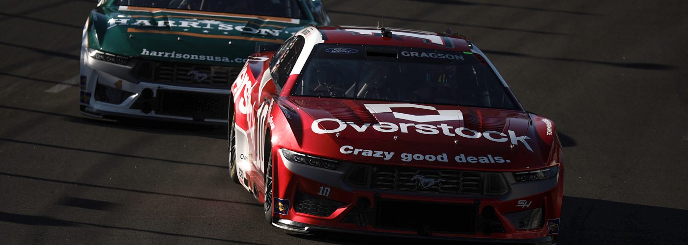 NORTH WILKESBORO, NORTH CAROLINA - MAY 19: Noah Gragson, driver of the #10 Overstock.com Ford, and Josh Berry, driver of the #4 Harrison's Ford, race during the NASCAR Cup Series All-Star Open at North Wilkesboro Speedway on May 19, 2024 in North Wilkesboro, North Carolina. (Photo by James Gilbert/Getty Images) | Getty Images