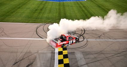 KANSAS CITY, KANSAS - MAY 04: Corey Heim, driver of the #11 Safelite Toyota, celebrates with a burnout after winning the NASCAR Craftsman Truck Series Heart of America 200 at Kansas Speedway on May 04, 2024 in Kansas City, Kansas. (Photo by Logan Riely/Getty Images) | Getty Images