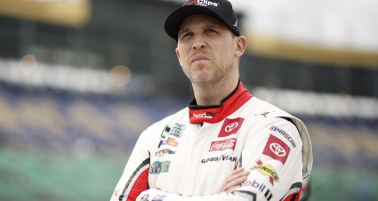 KANSAS CITY, KANSAS - MAY 04: Denny Hamlin, driver of the #11 Sport Clips Haircuts Toyota, looks on during qualifying for the NASCAR Cup Series AdventHealth 400 at Kansas Speedway on May 04, 2024 in Kansas City, Kansas. (Photo by Sean Gardner/Getty Images) | Getty Images