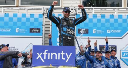 PORTLAND, OREGON - JUNE 01: Shane Van Gisbergen, driver of the #97 Quad Lock Chevrolet, celebrates in victory lane after winning the NASCAR Xfinity Series Pacific Office Automation 147 at Portland International Raceway on June 01, 2024 in Portland, Oregon. (Photo by Meg Oliphant/Getty Images) | Getty Images