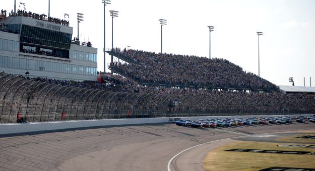 NEWTON, IOWA - JUNE 16: Kyle Larson, driver of the #5 HendrickCars.com Chevrolet, leads the field to the green flag to start the during the NASCAR Cup Series Iowa Corn 350 at Iowa Speedway on June 16, 2024 in Newton, Iowa. (Photo by James Gilbert/Getty Images) | Getty Images