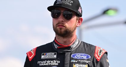 CONCORD, NORTH CAROLINA - MAY 25: Chase Briscoe, driver of the #14 Mahindra Compact Tractors Ford, walks the grid during practice for the NASCAR Cup Series Coca-Cola 600 at Charlotte Motor Speedway on May 25, 2024 in Concord, North Carolina. (Photo by Logan Riely/Getty Images) | Getty Images