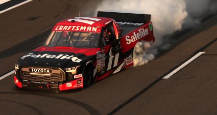 LONG POND, PENNSYLVANIA - JULY 12: Corey Heim, driver of the #11 Safelite Toyota, celebrates with a burnout after winning the NASCAR Craftsman Truck Series CRC Brakleen 175 at Pocono Raceway on July 12, 2024 in Long Pond, Pennsylvania. (Photo by Jonathan Bachman/Getty Images) | Getty Images
