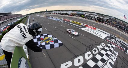 LONG POND, PENNSYLVANIA - JULY 13: Cole Custer, driver of the #00 Haas Automation Ford, takes the checkered flag to win the NASCAR Xfinity Series Explore The Pocono Mountains 225 at Pocono Raceway on July 13, 2024 in Long Pond, Pennsylvania. (Photo by James Gilbert/Getty Images) | Getty Images