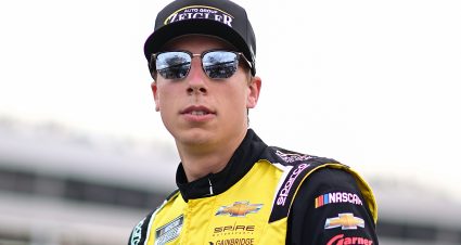 CONCORD, NORTH CAROLINA - MAY 25: Carson Hocevar, driver of the #77 Zeigler Auto Group Chevrolet, walks the grid during practice for the NASCAR Cup Series Coca-Cola 600 at Charlotte Motor Speedway on May 25, 2024 in Concord, North Carolina. (Photo by Logan Riely/Getty Images) | Getty Images