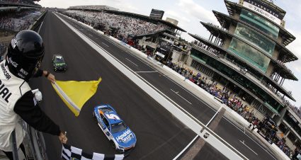 INDIANAPOLIS, INDIANA - JULY 21: Kyle Larson, driver of the #5 HendrickCars.com Chevrolet, takes the checkered flag under caution to win the NASCAR Cup Series Brickyard 400 at Indianapolis Motor Speedway on July 21, 2024 in Indianapolis, Indiana. (Photo by Sean Gardner/Getty Images) | Getty Images