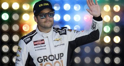 HOMESTEAD, FLORIDA - OCTOBER 21: Marco Andretti, driver of the #7 kin.com Chevrolet, waves to fans as he walks onstage during driver intros prior to the Kevin Harvick at Homestead-Miami Speedway on October 21, 2023 in Homestead, Florida. (Photo by James Gilbert/Getty Images) | Getty Images
