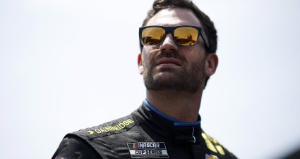 INDIANAPOLIS, INDIANA - JULY 20: Corey LaJoie, driver of the #7 Gainbridge Chevrolet, looks on during qualifying for the NASCAR Cup Series Brickyard 400 at Indianapolis Motor Speedway on July 20, 2024 in Indianapolis, Indiana. (Photo by Sean Gardner/Getty Images) | Getty Images