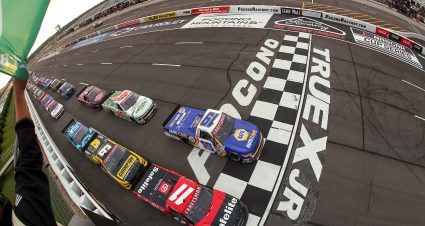 LONG POND, PENNSYLVANIA - JULY 12: Corey Heim, driver of the #11 Safelite Toyota, and Christian Eckes, driver of the #19 NAPA Auto Care Chevrolet, lead the field to a restart during the NASCAR Craftsman Truck Series CRC Brakleen 175 at Pocono Raceway on July 12, 2024 in Long Pond, Pennsylvania. (Photo by Jonathan Bachman/Getty Images) | Getty Images