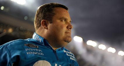 CONCORD, NC - OCTOBER 11: Roy McCauley, crew chief for the #12 Alltel Dodge driven by Ryan Newman, stand on the grid before the NASCAR Sprint Cup Series Bank of America 500 at Lowe's Motor Speedway on October 11, 2008 in Concord, North Carolina.  (Photo by Rusty Jarrett/Getty Images for NASCAR) | Getty Images