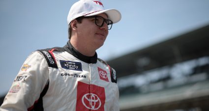 INDIANAPOLIS, INDIANA - JULY 20: Sheldon Creed, driver of the #18 Friends of Jaclyn Foundation Toyota, walks the grid during qualifying for the NASCAR Xfinity Series Pennzoil 250 at Indianapolis Motor Speedway on July 20, 2024 in Indianapolis, Indiana. (Photo by James Gilbert/Getty Images) | Getty Images