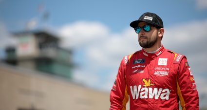 INDIANAPOLIS, INDIANA - JULY 19: Joe Graf Jr, driver of the #19 Toyota Gazoo Racing Toyota, walks the grid during practice for the NASCAR Xfinity Series Pennzoil 250 at Indianapolis Motor Speedway on July 19, 2024 in Indianapolis, Indiana. (Photo by James Gilbert/Getty Images) | Getty Images