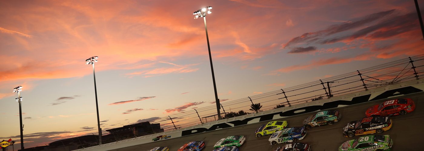 DAYTONA BEACH, FLORIDA - AUGUST 24: A general view of racing as the sun sets during the NASCAR Cup Series Coke Zero Sugar 400 at Daytona International Speedway on August 24, 2024 in Daytona Beach, Florida. (Photo by James Gilbert/Getty Images) | Getty Images