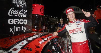 DAYTONA BEACH, FLORIDA - AUGUST 24: Harrison Burton, driver of the #21 DEX Imaging Ford, poses with the winner sticker on his car in victory lane after winning the NASCAR Cup Series Coke Zero Sugar 400 at Daytona International Speedway on August 24, 2024 in Daytona Beach, Florida. (Photo by Sean Gardner/Getty Images) | Getty Images