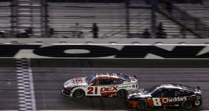 DAYTONA BEACH, FLORIDA - AUGUST 24: Harrison Burton, driver of the #21 DEX Imaging Ford, crosses the finish line ahead of Kyle Busch, driver of the #8 Cheddar's Scratch Kitchen Chevrolet, to win the NASCAR Cup Series Coke Zero Sugar 400 at Daytona International Speedway on August 24, 2024 in Daytona Beach, Florida. (Photo by Sean Gardner/Getty Images) | Getty Images