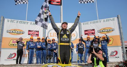 WEST ALLIS, WISCONSIN - AUGUST 25: Layne Riggs, driver of the #38 Zorn Compressor & Equipment Ford, celebrates in victory lane after winning the NASCAR Craftsman Truck Series The Milwaukee Mile at The Milwaukee Mile on August 25, 2024 in West Allis, Wisconsin. (Photo by Jonathan Bachman/Getty Images) | Getty Images