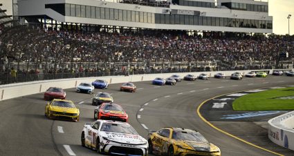 RICHMOND, VIRGINIA - AUGUST 11: Denny Hamlin, driver of the #11 FedEx Rewards Toyota, and Christopher Bell, driver of the #20 DEWALT Carpentry Solutions Toyota, race during the NASCAR Cup Series Cook Out 400 at Richmond Raceway on August 11, 2024 in Richmond, Virginia. (Photo by Logan Whitton/Getty Images) | Getty Images