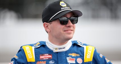 LONG POND, PENNSYLVANIA - JULY 12: Christian Eckes, driver of the #19 NAPA Auto Care Chevrolet, waits on the grid prior to the NASCAR Craftsman Truck Series CRC Brakleen 175 at Pocono Raceway on July 12, 2024 in Long Pond, Pennsylvania. (Photo by James Gilbert/Getty Images) | Getty Images