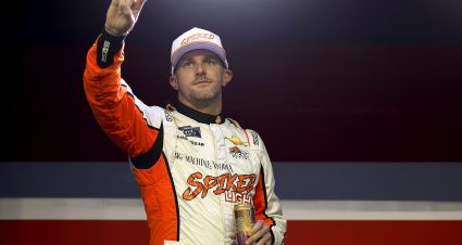 DAYTONA BEACH, FLORIDA - AUGUST 23: Parker Kligerman, driver of the #48 Spiked Lite Tropical Coolers Chevrolet, waves to fans as he walks onstage during driver intros prior to the NASCAR Xfinity Series Wawa 250 Powered by Coca-Cola at Daytona International Speedway on August 23, 2024 in Daytona Beach, Florida. (Photo by Sean Gardner/Getty Images) | Getty Images