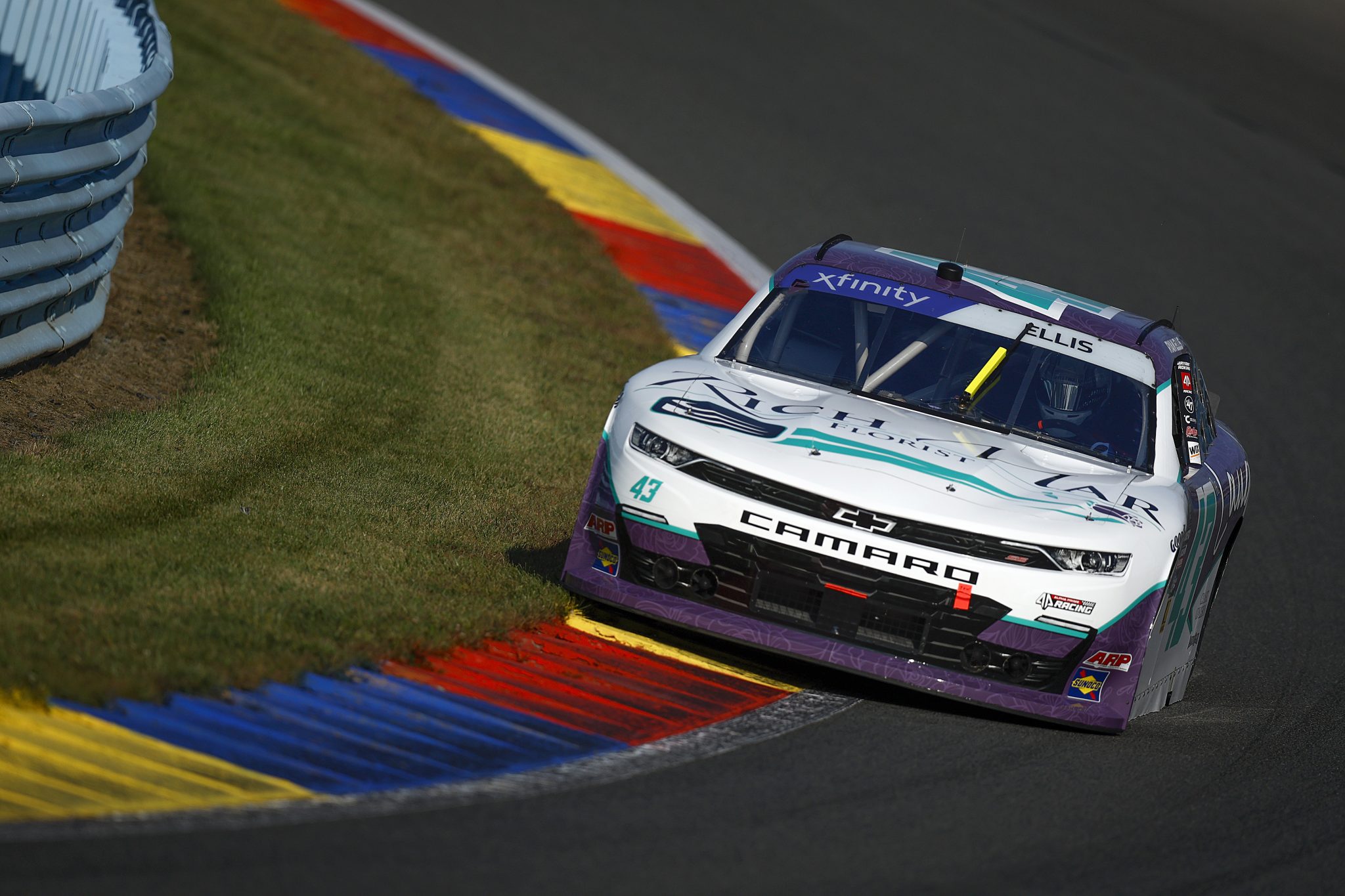 WATKINS GLEN, NEW YORK - SEPTEMBER 14: Ryan Ellis, driver of the #43 Rich Mar/Laughlin Family Foundation Chevrolet, drives during practice for the NASCAR Xfinity Series Mission 200 at The Glen at Watkins Glen International on September 14, 2024 in Watkins Glen, New York. (Photo by Sean Gardner/Getty Images) | Getty Images
