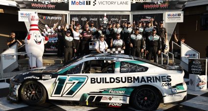 WATKINS GLEN, NEW YORK - SEPTEMBER 15: Chris Buescher, driver of the #17 BuildSubmarines.com Ford, and crew celebrate in victory lane after winning the NASCAR Cup Series Go Bowling at The Glen at Watkins Glen International on September 15, 2024 in Watkins Glen, New York. (Photo by Chris Graythen/Getty Images) | Getty Images