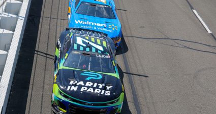 LONG POND, PENNSYLVANIA - JULY 14: Corey LaJoie, driver of the #7 Parity in Paris Chevrolet, and Justin Haley, driver of the #51 Walmart Health & Wellness Ford, race during the NASCAR Cup Series The Great American Getaway 400 Presented by VISITPA.com at Pocono Raceway on July 14, 2024 in Long Pond, Pennsylvania. (Photo by Jonathan Bachman/Getty Images) | Getty Images