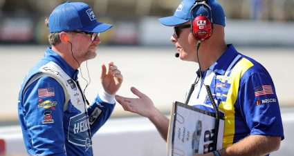 BRISTOL, TENNESSEE - SEPTEMBER 20: Dale Earnhardt Jr., driver of the #88 Hellmann's Chevrolet, (L) speaks to a crew member on the grid during qualifying for the NASCAR Xfinity Series Food City 300 at Bristol Motor Speedway on September 20, 2024 in Bristol, Tennessee. (Photo by Jonathan Bachman/Getty Images) | Getty Images