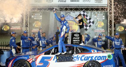 BRISTOL, TENNESSEE - SEPTEMBER 21: Kyle Larson, driver of the #5 HendrickCars.com Chevrolet, celebrates with his son, Owen Larson in victory lane after winning the NASCAR Cup Series Bass Pro Shops Night Race at Bristol Motor Speedway on September 21, 2024 in Bristol, Tennessee. (Photo by James Gilbert/Getty Images) | Getty Images